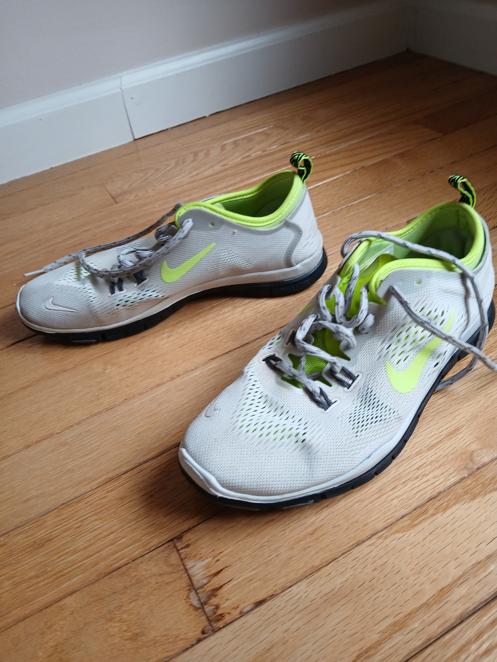 Nike White Athletic Trainers with Neon Yellow Accents